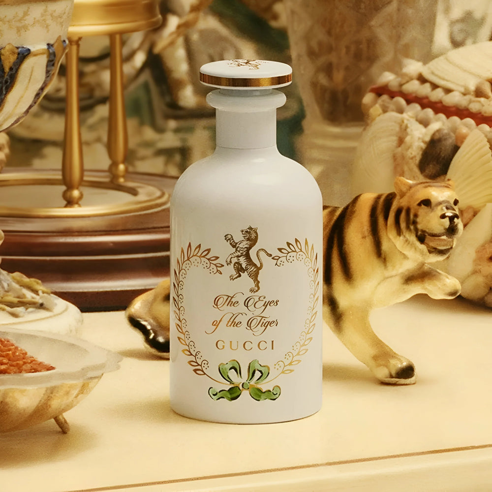 “Gucci The Eye Of The Tiger unisex perfume styled in a premium luxury setting”